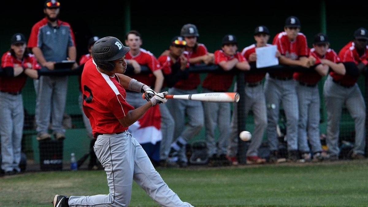Butler #2 Alex Almonte hits the ball during Friday's Butler at Myers Park matchup in a battle of teams tied for first place in the Southwestern 4A baseball standings.
