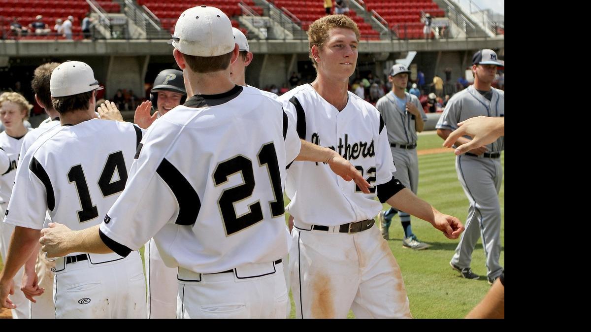 
Providence's Zach Brown (21) high-fives Trevor Rhyne (22) after winning Game 2 of Saturday’s NCSHAA 4A championship baseball series at Five County Stadium in Zebulon. Providence rolled to a 10-0 win over Millbrook in Game 2, then cruised Saturday night to a 10-2 victory in Game 3 to take the series 2-1 and win the state championship.


