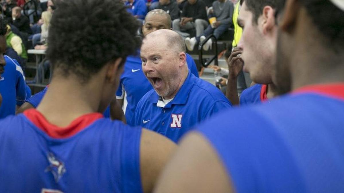 North Meck head coach Duane Lewis instructs his players while facing Hough during a MECKA conference prep basketball game Friday, January 8, 2016 at Hough High School. North Meck won 68 - 63. Photo by JASON E. MICZEK - Special to the Observer