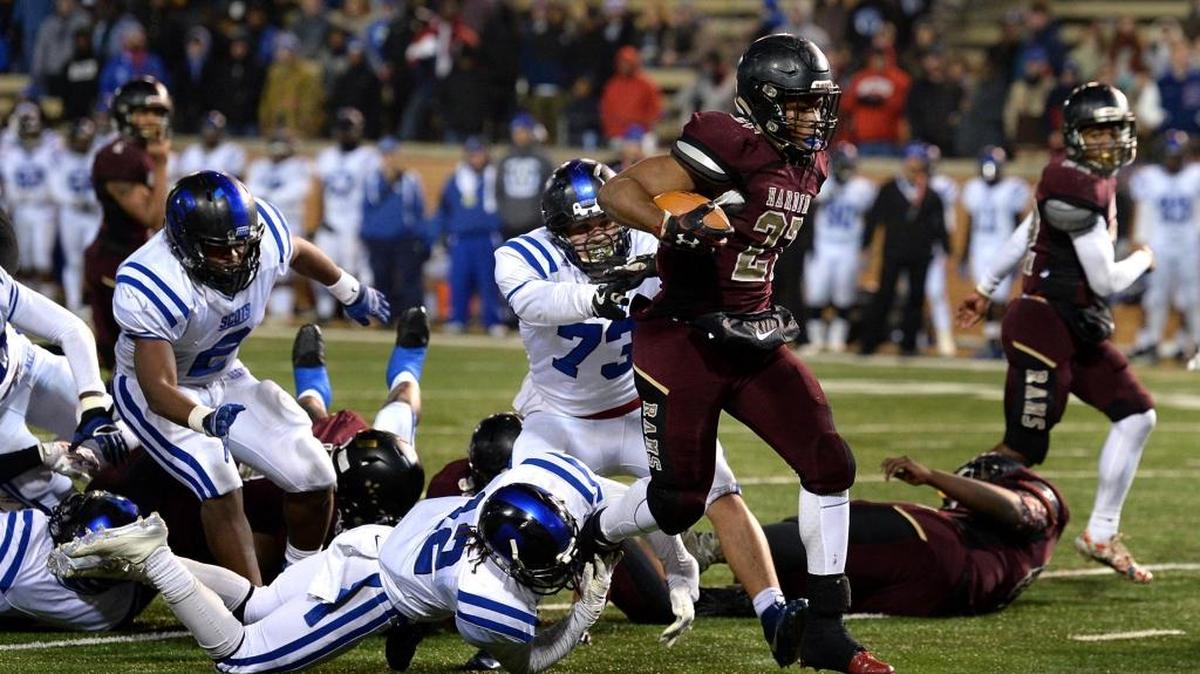 Harding University running back Quavaris Crouch, center, rushes for a touchdown as the Scotland County defense fails to make the tackle during first half action in the NCHSAA 4A State Championship game at BB&T Field in Winston-Salem, NC on Saturday, December 9, 2017.