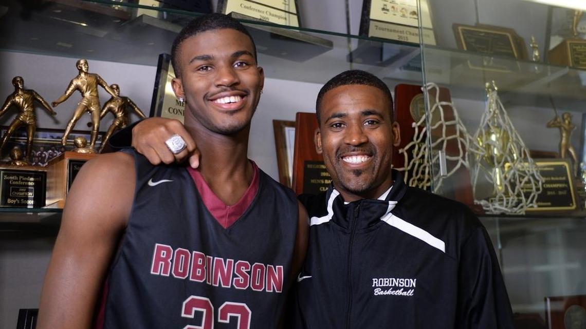Concord Robinson's Lavar Batts Jr. is the top ranked recruit in the NC basketball class of 2017. Shown here with his father Lavar Batts Sr., he's committed to VCU and returns for a senior season on a high. In his last high school game, he and his father, who is his high school coach, won a N.C. 3A state championship.
