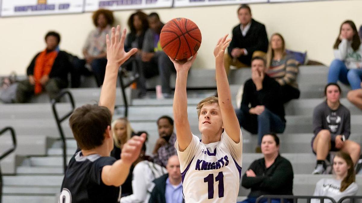 Ardrey Kell’s Luke Stankavage(11) knocks down the 3-pointer during early first half action. Ardrey Kell would host the Huskies of Hough Tuesday November 27, 2018.