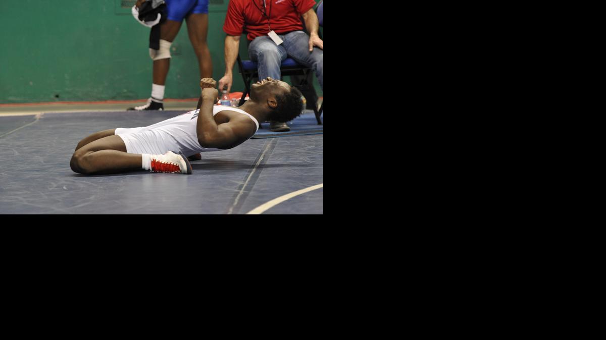 
Mallard Creek wrestler Waddell McNeely celebrates after winning the school’s first state wrestling championship this year. He was also one of two Charlotte-Mecklenburg Schools wrestlers to win state titles, the first time a CMS wrestler has won since 2008.
