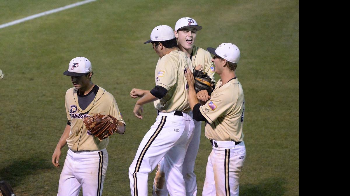 
 Providence High starting pitcher Joah Hiatt on left walks off the field after Providence defeated Butler 8-4 during Game 1 of NCHSAA 4A Western Regional baseball game played at Providence High on May 26,2015.
