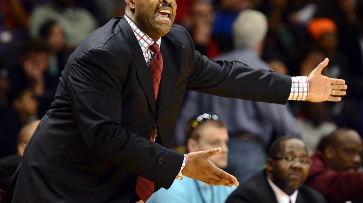 West Charlotte head coach Baronton Terry yells instructions to his team during the Western Regional Basketball Championships 4-A vs Page at the Greensboro Coliseum Special Events Center in Greensboro, NC on Saturday, March 8, 2014. Page defeated West Charlotte 69-63.