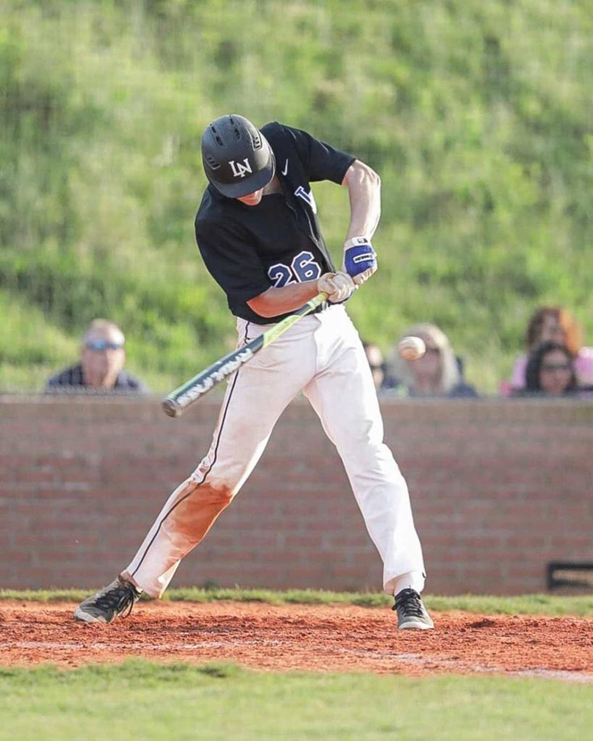 Lake Norman's Carter Sheppard check swings and gets the base hit to drive in a run. Hough would face the number 1 seed Lake Norman Wildcats in the 4A I-Meck Tournament Championship.