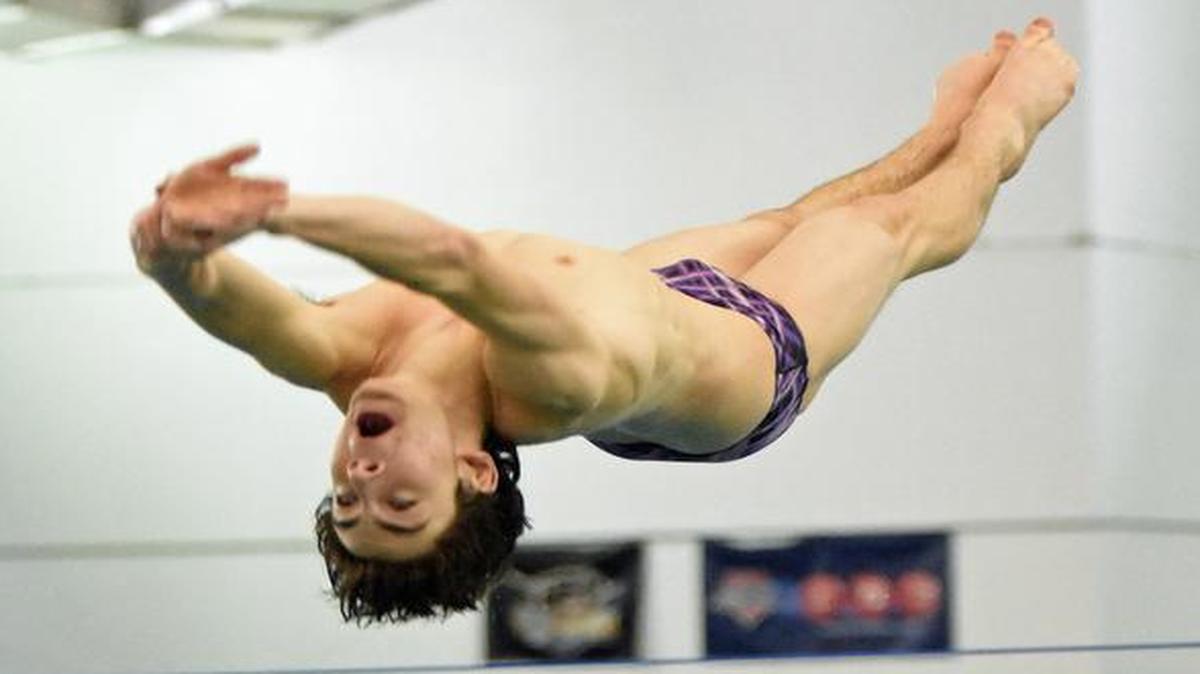 Pine Lake Prep’s Nick Garberina works on a dive during practice at the Huntersville Family Fitness and Aquatics Center.