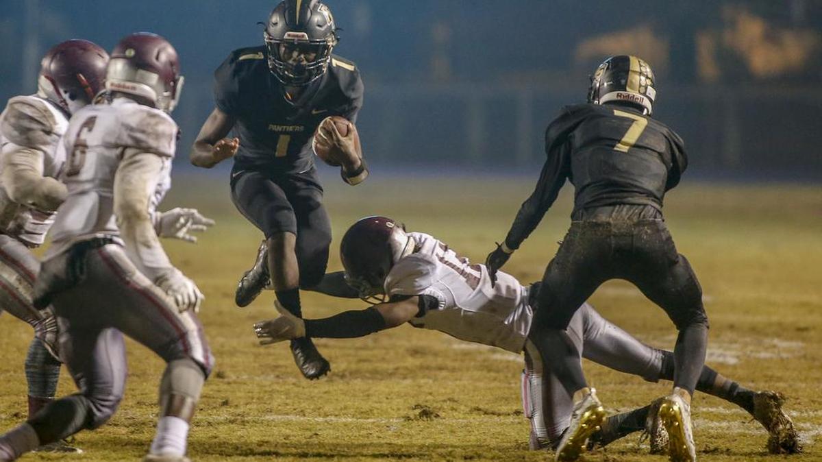 Providence running back Jake Snapp finds an opening in West Mecklenburg’s defense in the first quarter of Friday’s SoMeck 4A football game. Providence won 48-8, ending the Hawks’ eight-game winning streak.