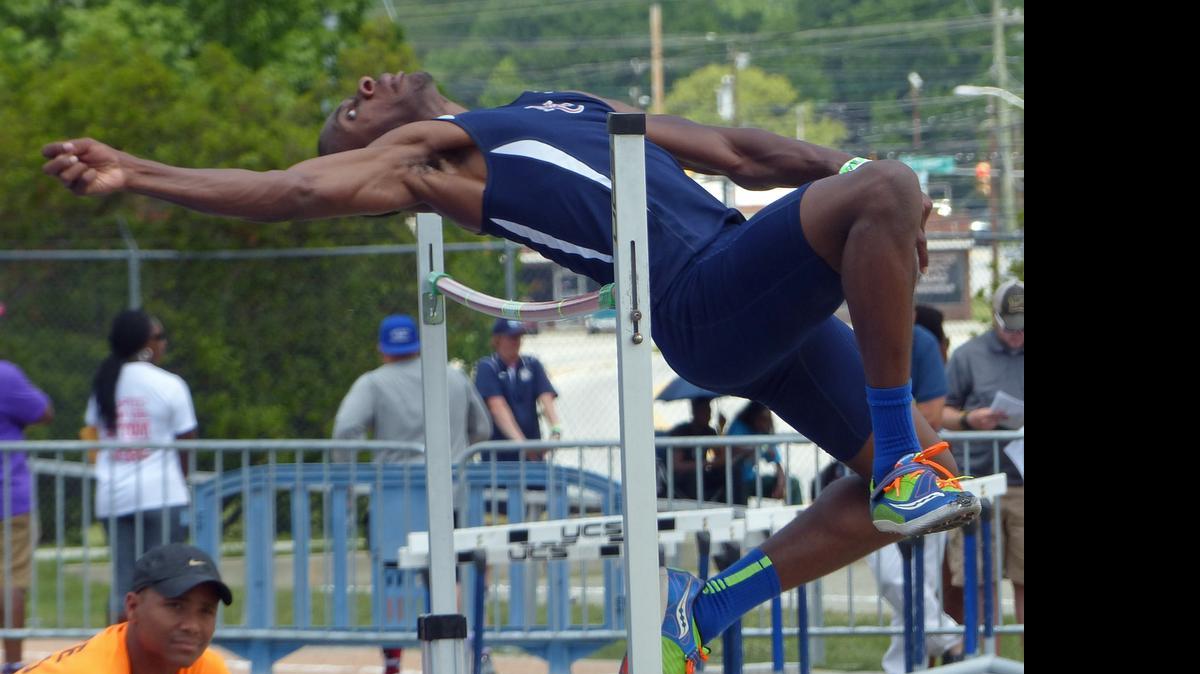 
Mallard Creek senior Keon Howe keeps an eye on the crossbar as he makes an attempt during the boys high jump competition at the NCHSAA 4A state championships on Saturday, May 9, 2015, at N.C A&T University’s Irwin Belk Track in Greensboro, N.C. Howe won the event with a best jump of 6 feet, 10 inches. 

