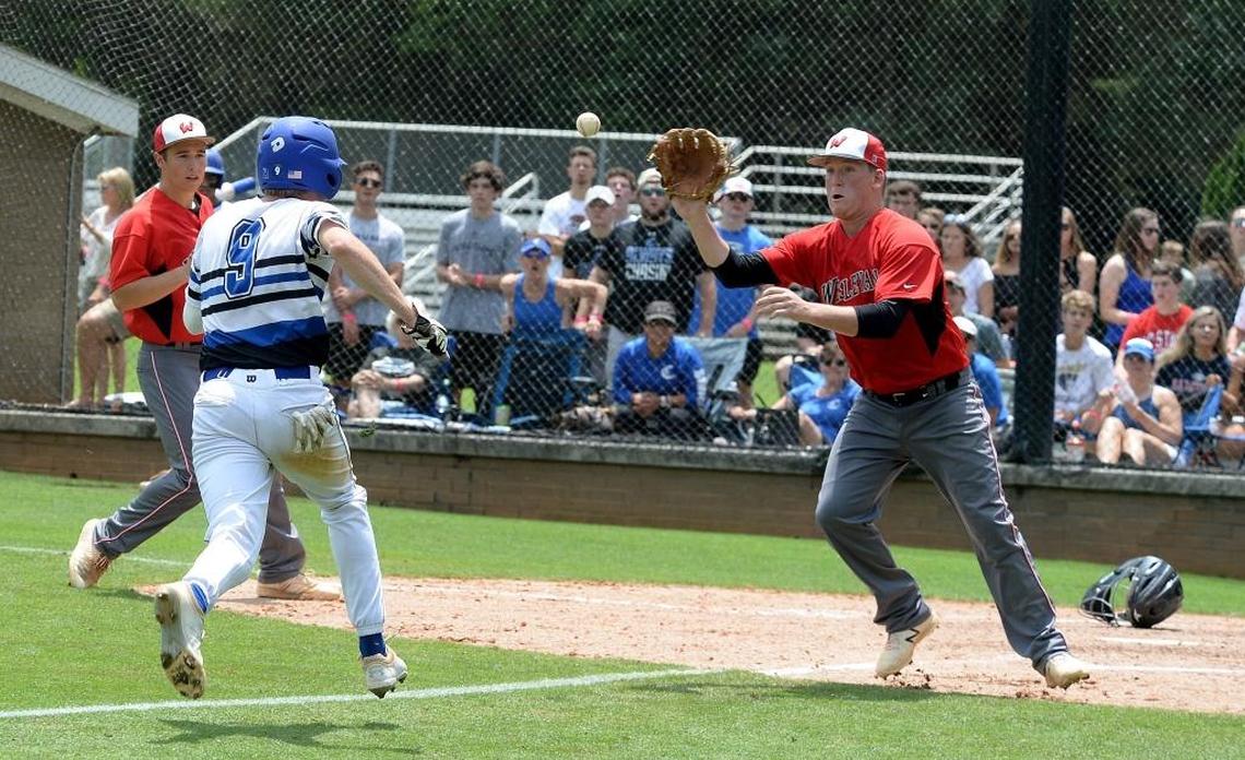 Wesleyan catcher Koty Proctor tags Charlotte Christian #9 Jonathan Jagielski out at home plate during Saturday's championship baseball game. Wesleyan Christian Academy defeated Charlotte Christian in the NCISAA 3A state championship baseball game at Charlotte Country Day Saturday afternoon.
