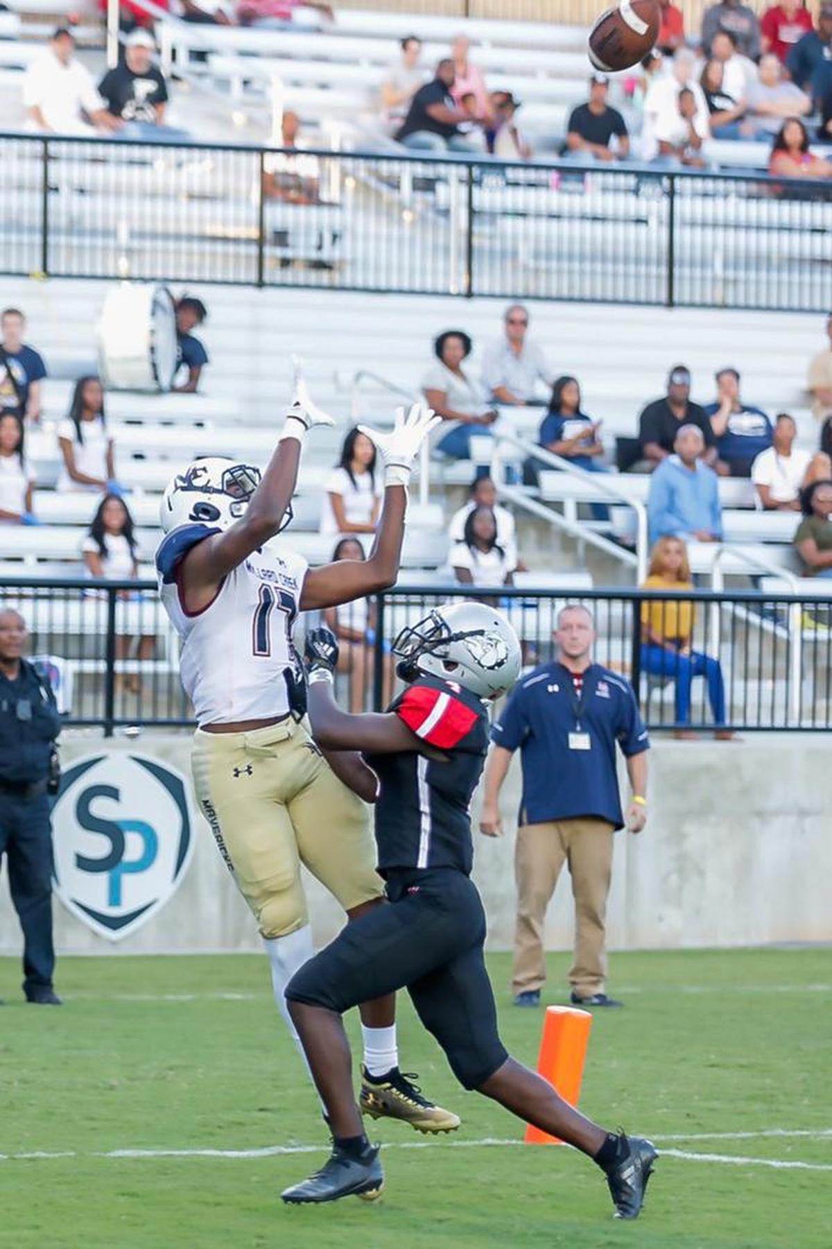 Mallard Creek’s Coleman Jeffcoat catchs the touchdown pass early in the first quarter of Friday’s game against Butler.