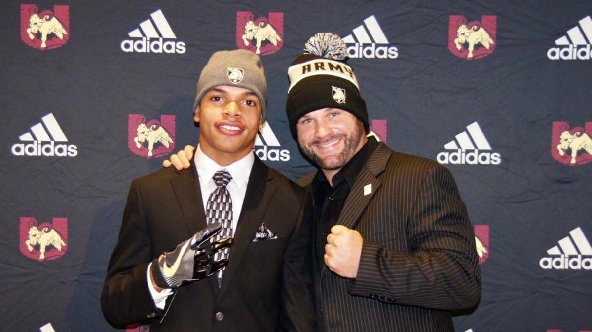 Harding High state championship QB Braheam Murphy signed with Army Wednesday. He’s shown with his head coach Sam Greiner, whom he lives with