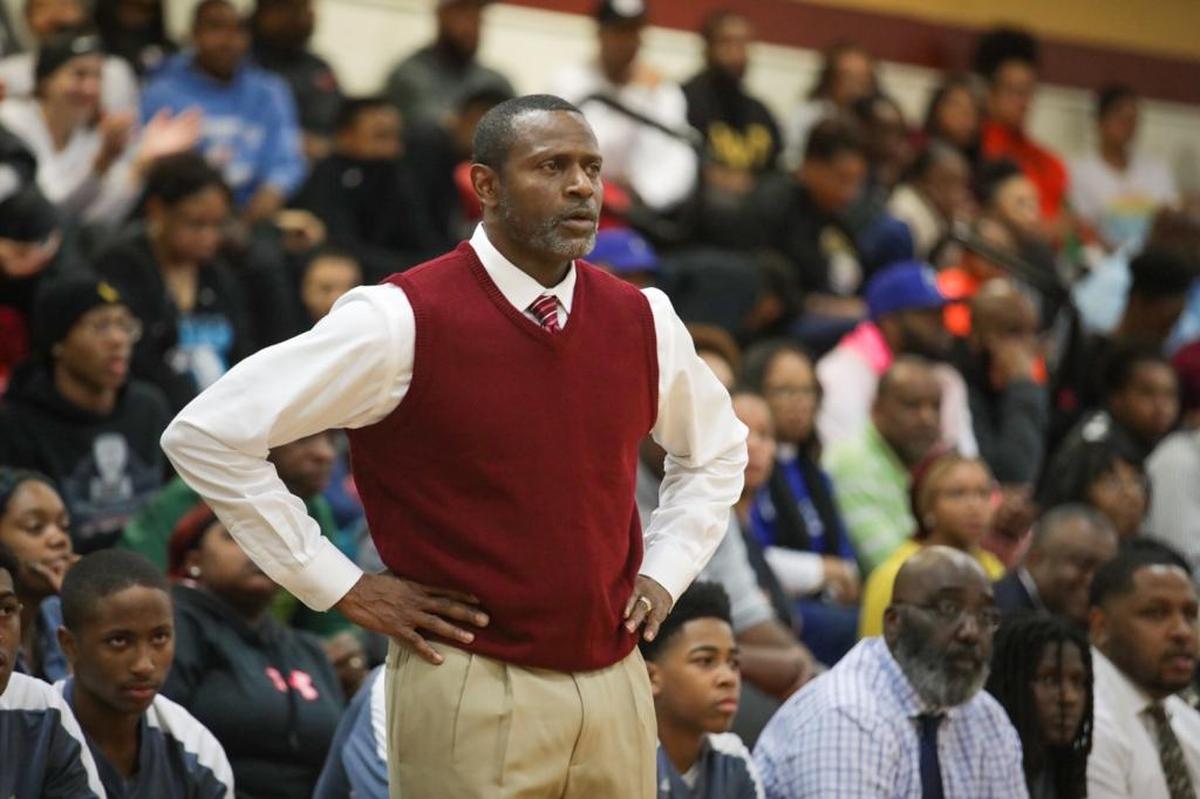 Harding High coach Walter Aiken watches the action in Friday’s game against Olympic.