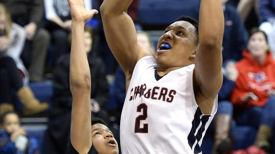Providence Day's Grant Williams (2) scored the game-winning basket Tuesday to upset nationally ranked Wheeler. Williams, a Tennessee recruit, and the Chargers advanced to Wednesday night’s 9:15 championship game against Wheeler (GA).