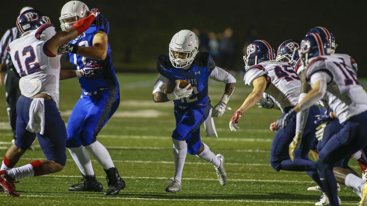 Charlotte Christian running back Ben Williams finds an opening in Providence Day’s defense in the second quarter of Friday’s high school football game. Christian won 28-12.