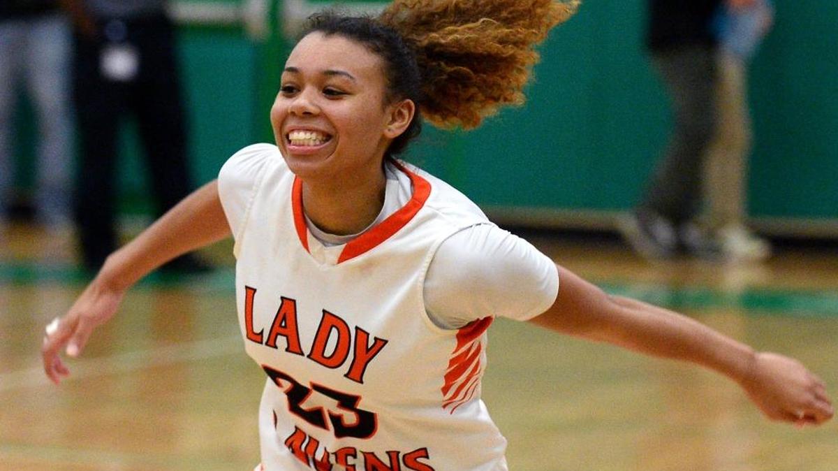Rocky River's Ariana Nance runs to a teammate to celebrate the team's victory over the Butler Bulldogs in the Southwestern 4A championship game action at Myers Park High School on Friday, February 17, 2017. Rocky River defeated Butler 56-34.