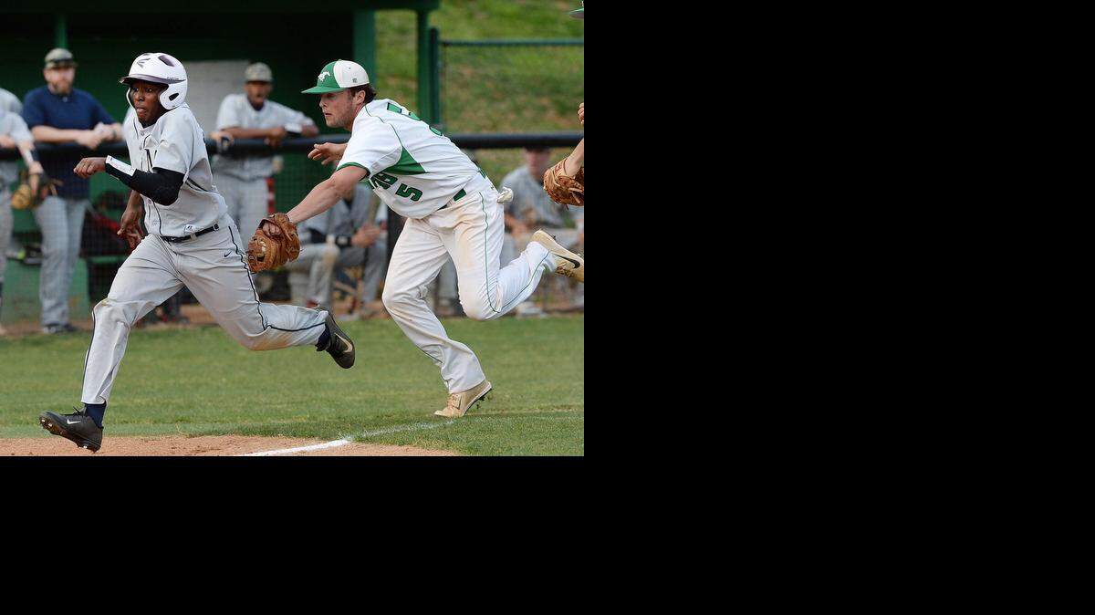 
Myers Park third baseman Bo Owens tags Mallard Creek’s Myles Bowie on a squeeze play during the Jack Sink Invitational baseball tournament at Myers Park High on Monday. Myers Park defeated Mallard Creek 8-7.

