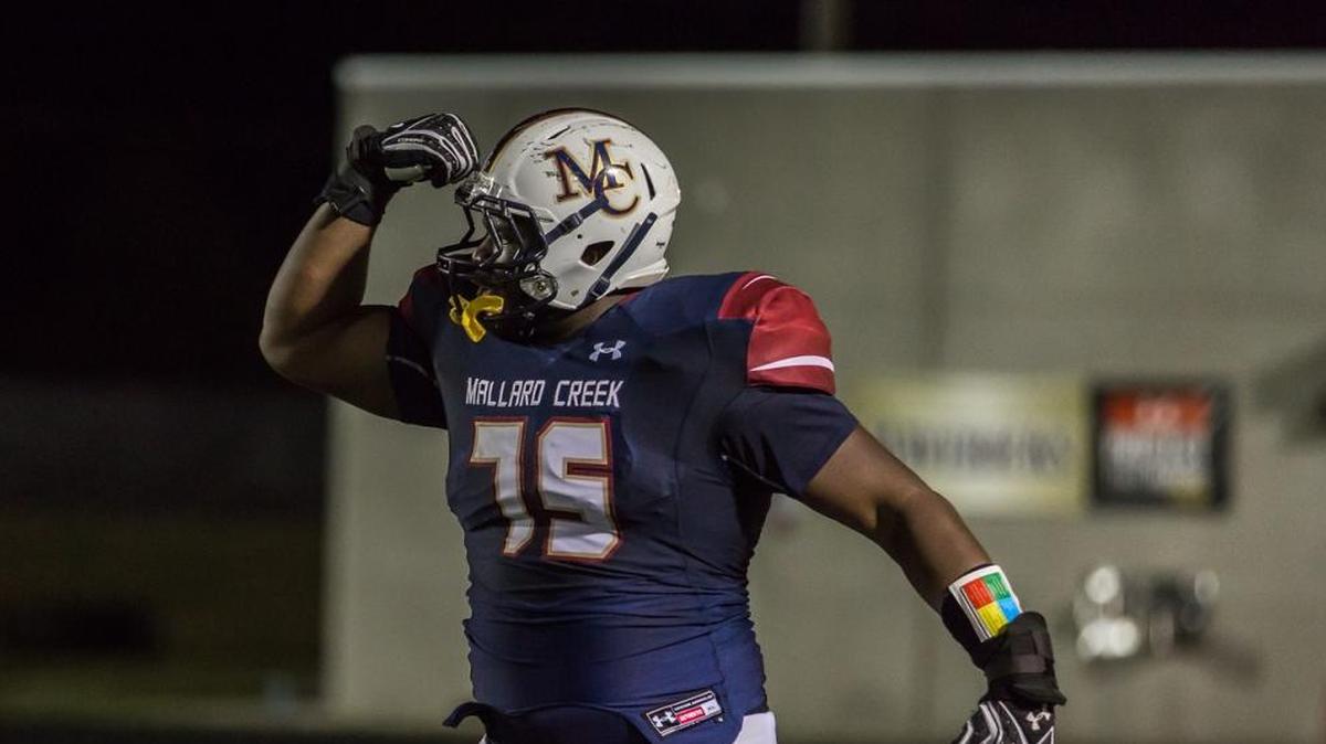 Mallard Creek defensive lineman Jordan Davis, who has helped the Mavericks to an undefeated regular-season, committed to Georgia Thursday