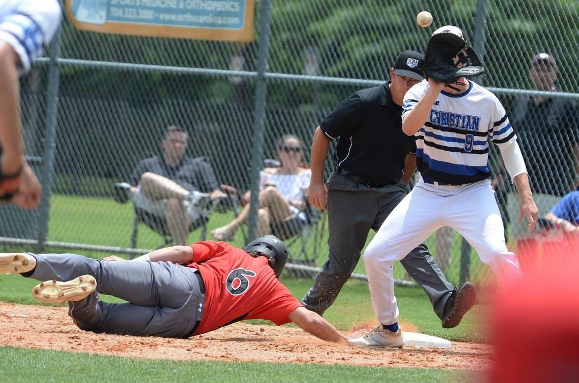 Charlotte Christian #9 Jonathan Jagielski tries to tag Wesleyan Christian Academy #6 Jackson Prillaman out at first base during Saturday's championship baseball game. Wesleyan Christian Academy defeated Charlotte Christian in the NCISAA 3A state championship baseball game at Charlotte Country Day Saturday afternoon.