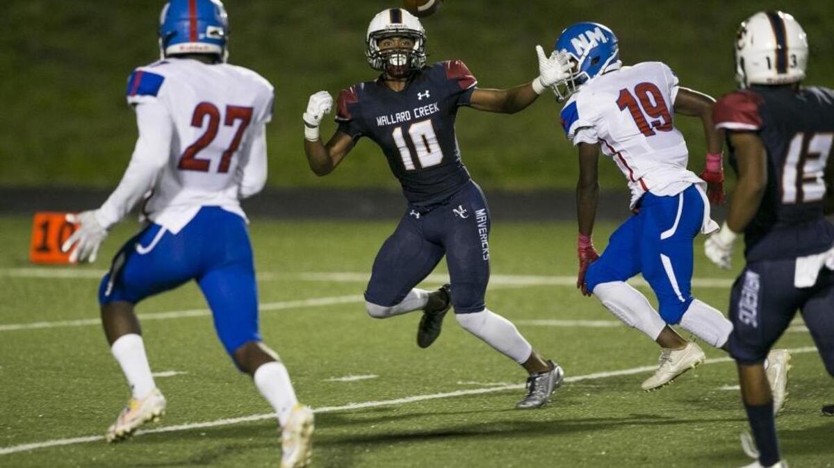 Mallard Creek senior wide receiver Teddy Creecy (10) can't haul in a pass while being covered by the North Meck defense during a prep football game Friday, October 20, 2017 at Mallard Creek High School in Charlotte, NC. Photo by JASON E. MICZEK - Special to the Observer
