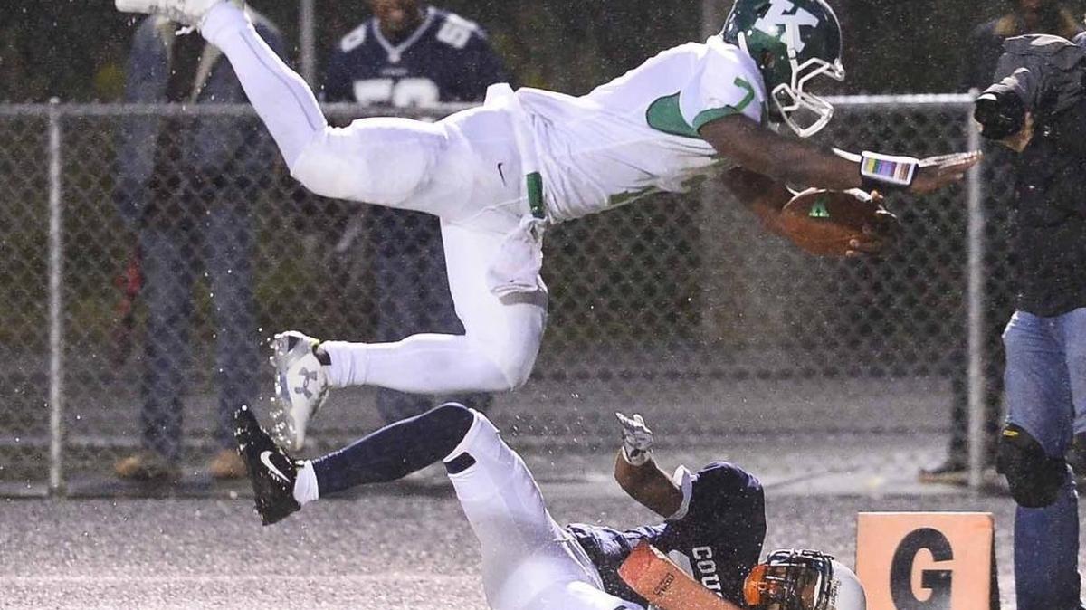 
A.L. Brown running back Jaylyn Cagle leaps into the end zone to score against Vance Monday at Rocky River High.
