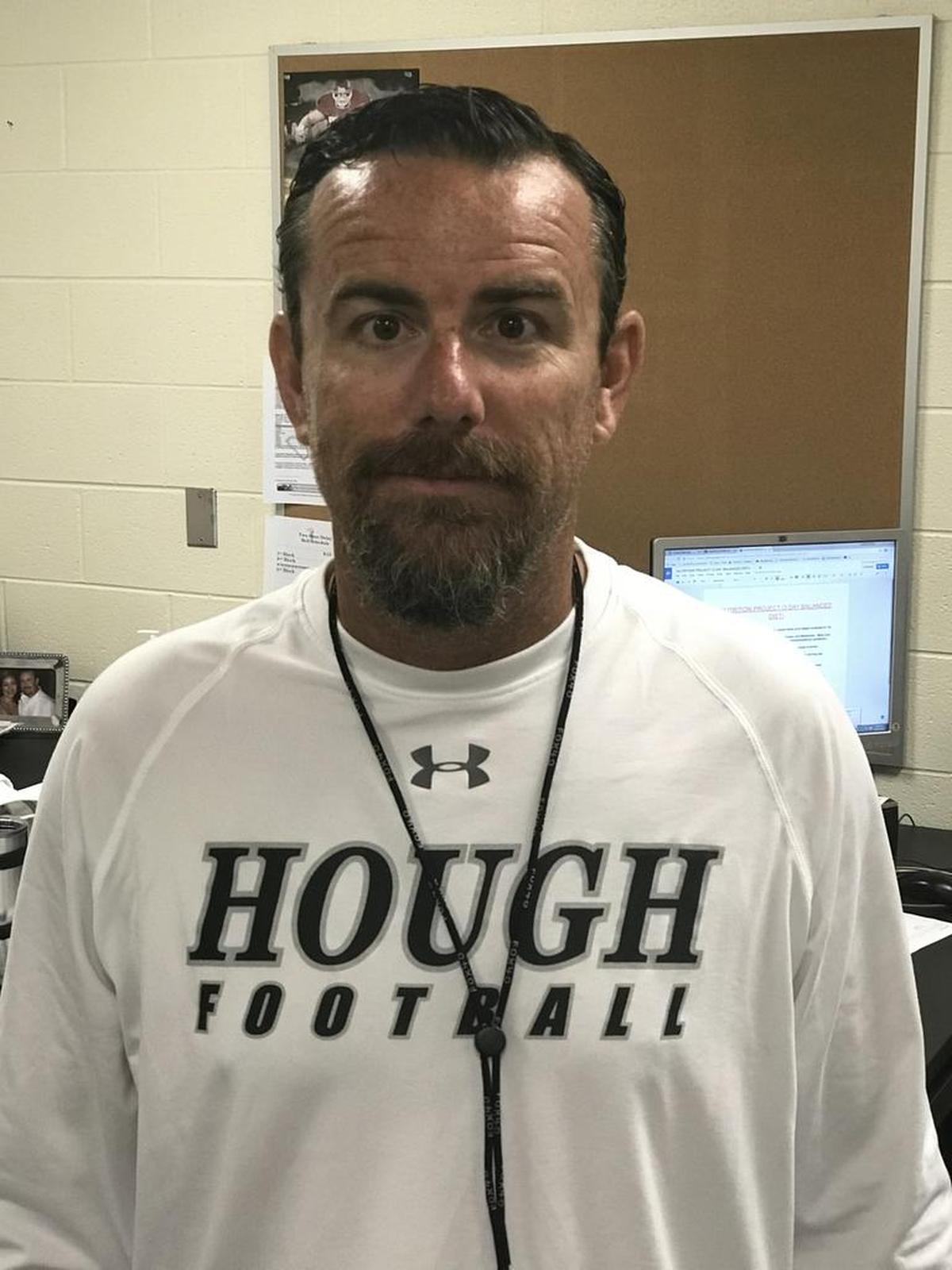 Matthew Jenkins is in his first season as football coach at Hough High.