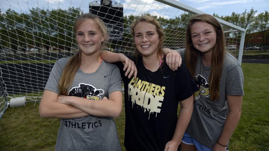 Sophomore Mady Ellis, left, junior Molly McGarry and senior Jenn Simons are members of Providence High girls’ soccer team, ranked No. 1 in USA Today’s national poll.