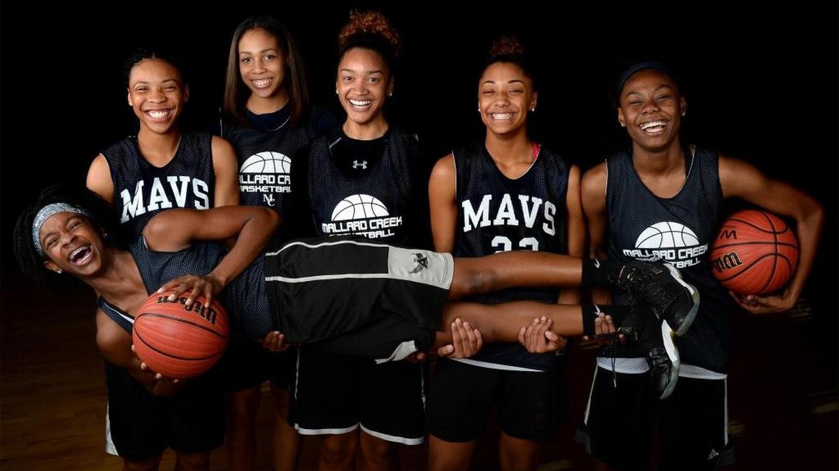 Mallard Creek’s girls are still No. 1 in the Sweet 16. Janay Sanders breaks out laughing as teammates Dazia Lawrence, Kay'lla Richardson, Ja'Nea Davis, Ahlana Smith and E'mya Price hold her during a photo shoot at Mallard Creek High