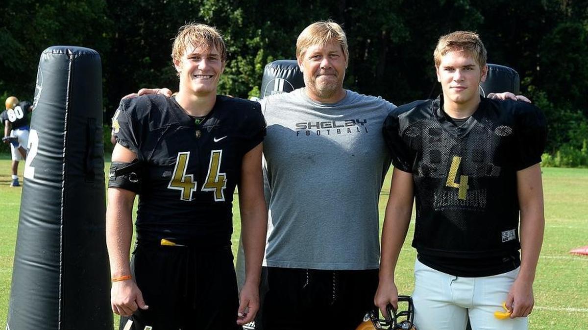 It’s a family affair: Shelby High LB Dax Hollifield, his dad Aubrey Hollifield (Shelby High head basketball coach and also a defensive line football coach and an assistant track coach), and Jack Hollifield, Dax’s brother and a junior varsity football player at Shelby High. Dax will be a third-generation college football player in his family, as his dad played for Wake Forest and his grandfather played for Western Carolina.
