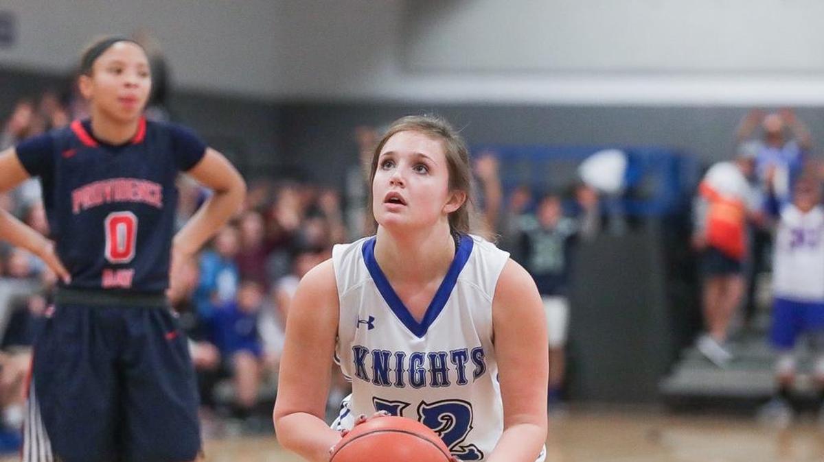 Charlotte Christian's Meg Martin (12) attempts the first shot of a one and one during early 1st quarter action. Providence Day would defeat Charlotte Christian 61-24 Tuesday January 30, 2018.