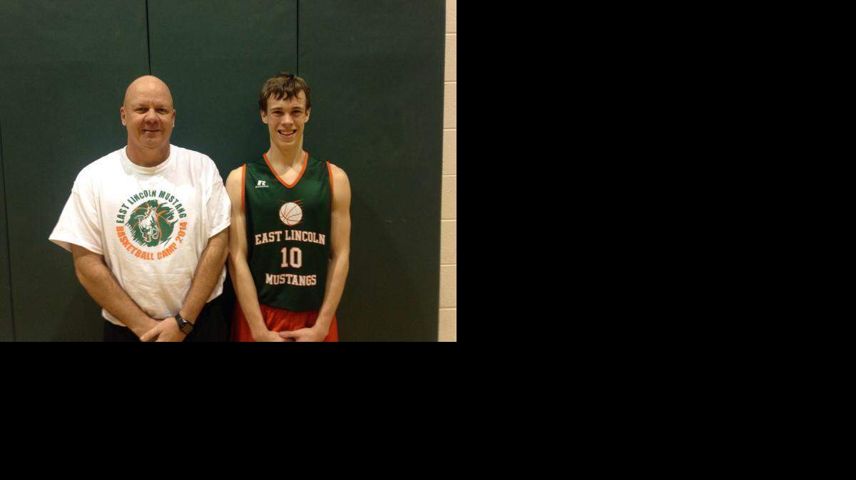 
East Lincoln senior point guard Connor Ashley, right, is the son of assistant coach Chip Ashley. Connor grew up around the Mustangs’ gym and is now a key part of an undefeated team.
