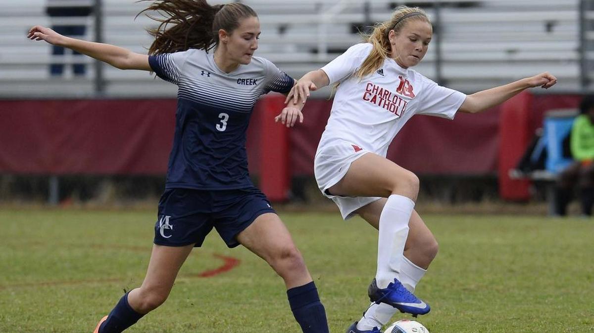 Charlotte Catholic’s Eveleen Hahn on right, was named a high school All-American girls soccer player this week