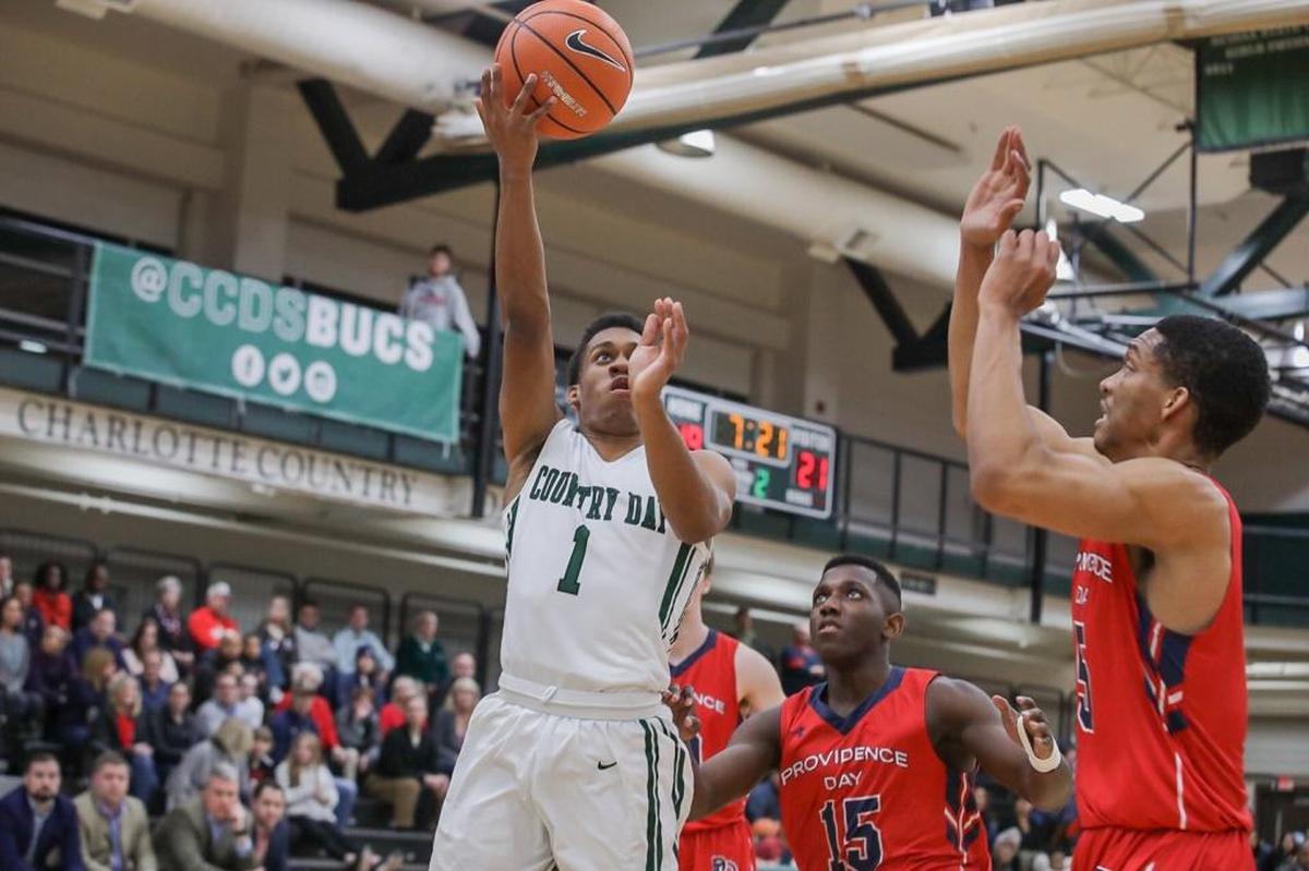 Charlotte Country Day’s Rylan McLaurin shoots the layup during Friday’s game against Providence Day.