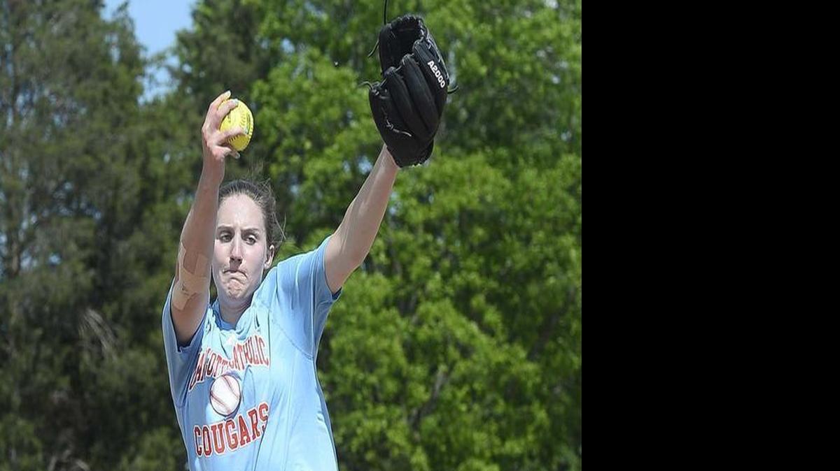 Charlotte Catholic pitcher Carrie Eberle fires off a pitch during softball practice at Jack Hughes Park in Pineville on Tuesday.