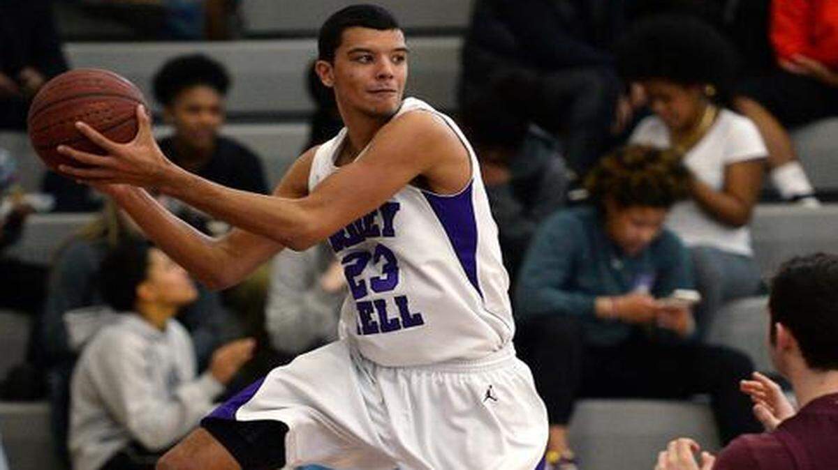 
Ardrey Kell's Rhyle Scott (23) attempts to save a loose ball from going out of bounds during first round NCHSAA playoff action vs South Caldwell on Saturday February 28, 2015 at Ardrey Kell High School in Charlotte, N.C.
