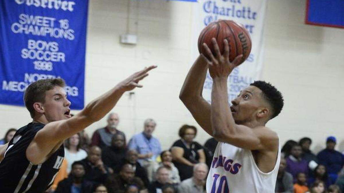 North Meck high's Davion Mintz in center, shoots the ball during Tuesday night's game played at North Meck high school Feb. 09, 2016.