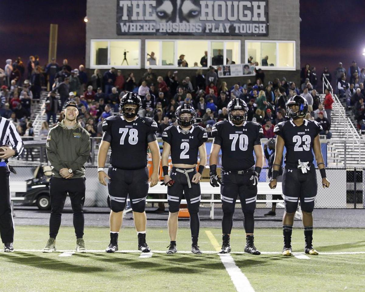 Carolina Panthers running back Christian McCaffrey handled the coin toss before Friday’s Hough-Mallard Creek game
