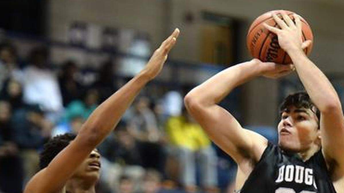
Hough forward Luke Maye (32) is one of eight Observer-area players to make the Associated Press all-state team, which was released Thursday
