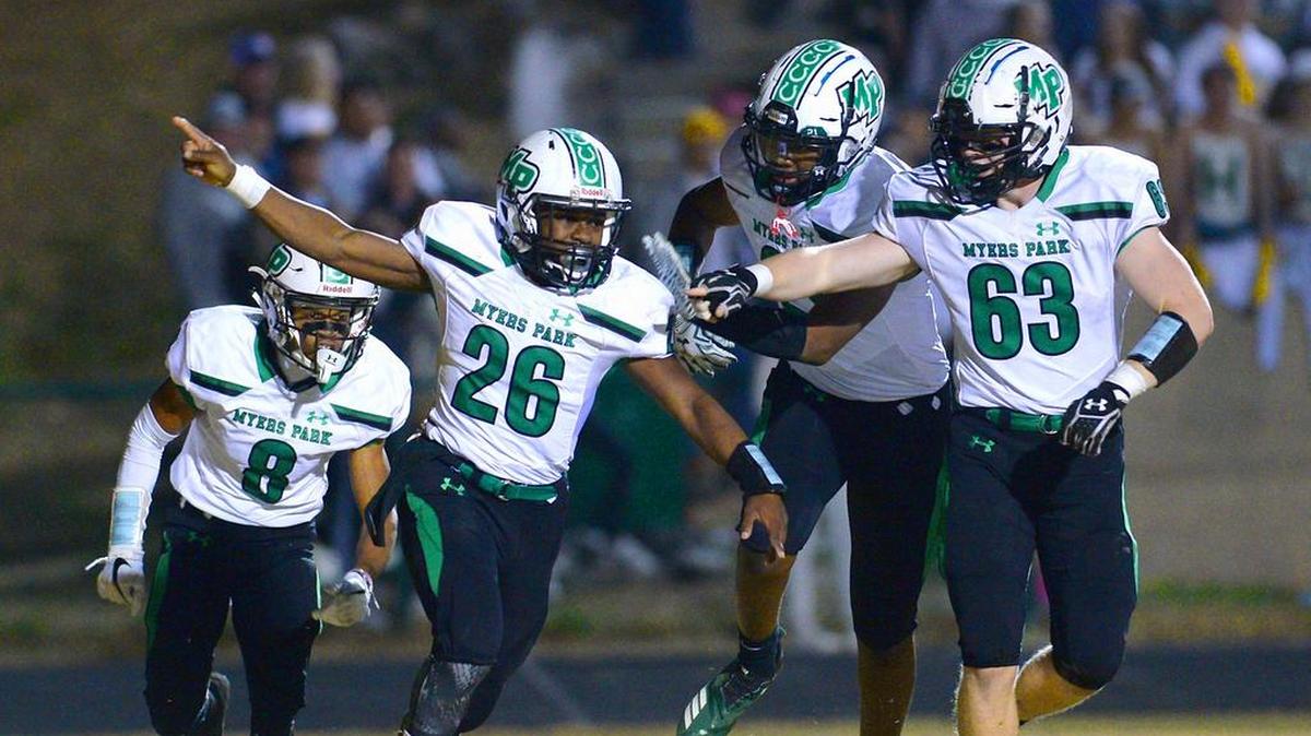 Myers Park’s Ja’toine Fields (28) and teammates celebrate after his touchdown run against Richmond Senior in their state playoff game last week.