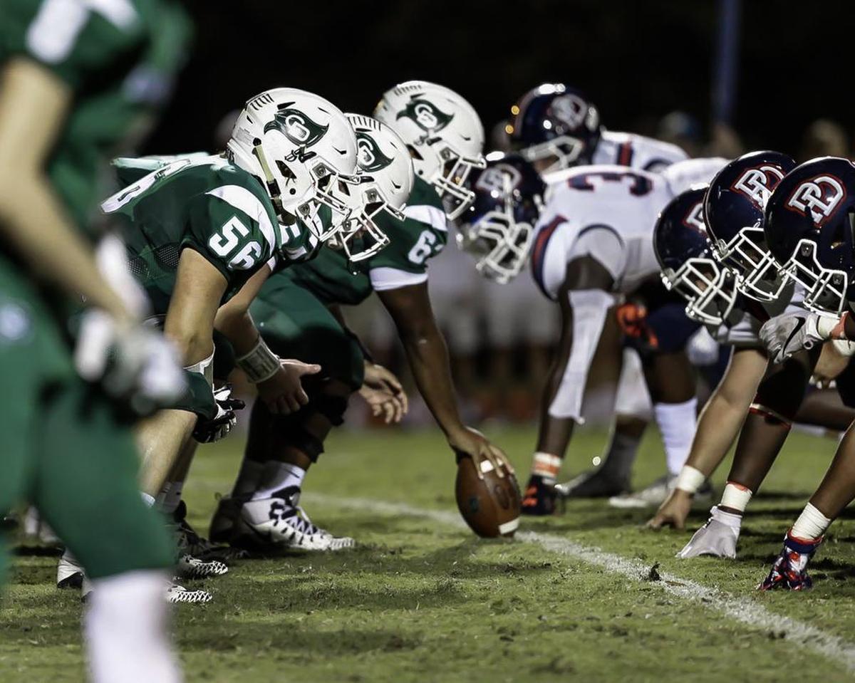 Charlotte Country Day and Providence Day (left) get ready for action in Friday’s game. Providence Day won 42-6.