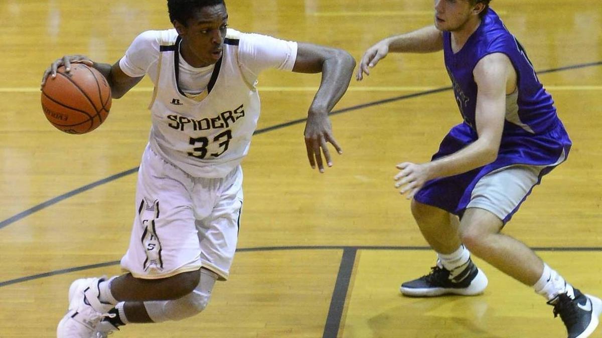 Concord High's Justin Vaught has helped the Spiders to a six-game win streak and a No. 4 ranking in the Observer’s Sweet 16 high school basketball poll.