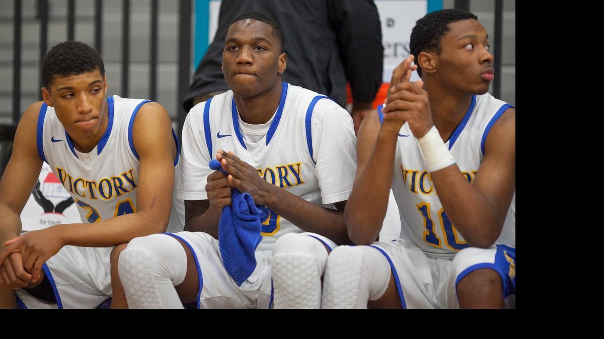 
Victory Christian’s Ebuka Izundu (center) will announce his college decision Wednesday morning, his high school coach told the Observer. 
