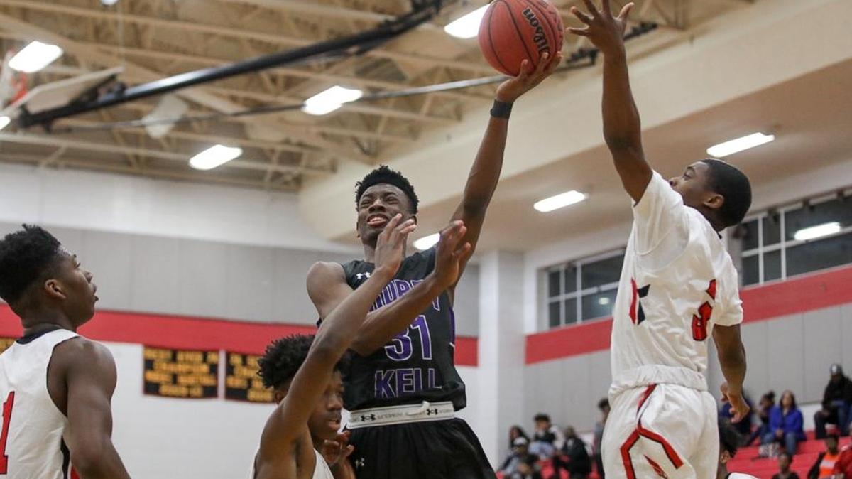 Ardrey Kell junior Christian Pickens (31) drives the lane in Friday’s game at Berry.