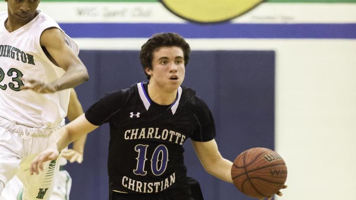 Charlotte Christian’s J.C Tharrington takes the pass off the rebound and quickly moves the ball up the court during first half action