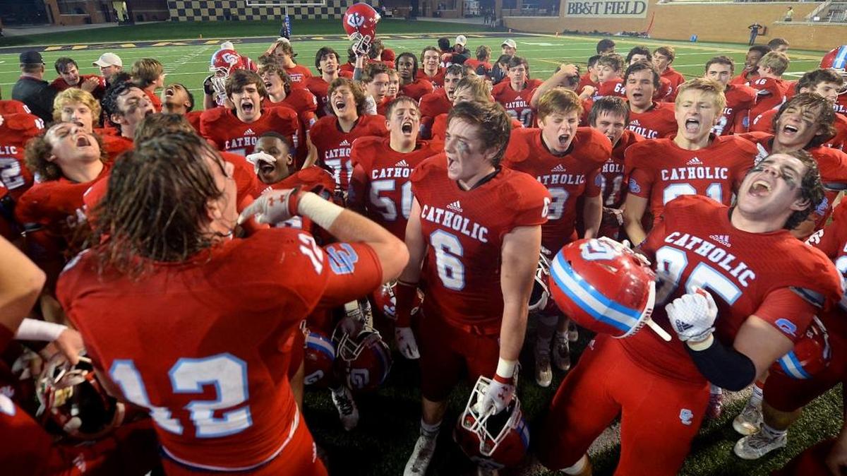 Charlotte Catholic celebrates their victory over J.H. Rose in the NC 4A football championship game at BB&T Field in Winston-Salem, NC on Saturday, December 12, 2015. Catholic defeated J.H. Rose 27-20.