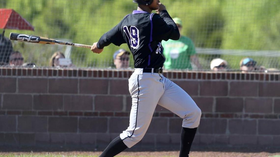 Porter Ridge High pitcher/infielder Brennan Malone watches his RBI-single against Independence High on Monday, April 30, 2018. Malone is one of the nation's top ranked pitchers.