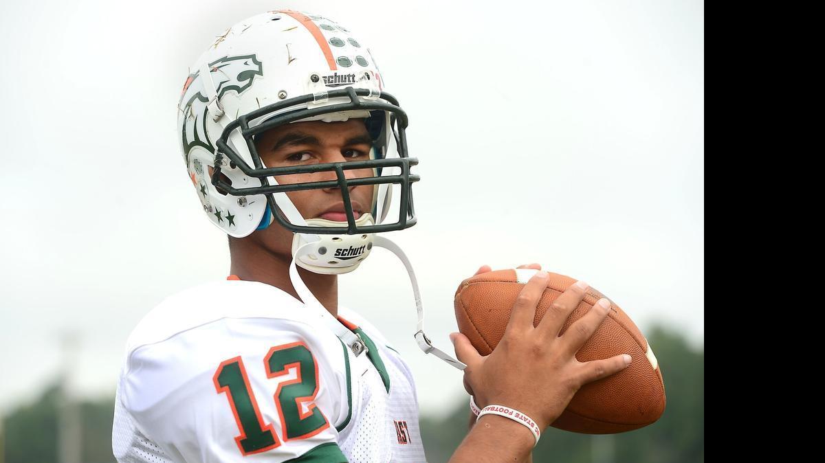 
After committing to Duke in April, East Lincoln quarterback Chazz Surratt says he has changed his mind and will play football for North Carolina
