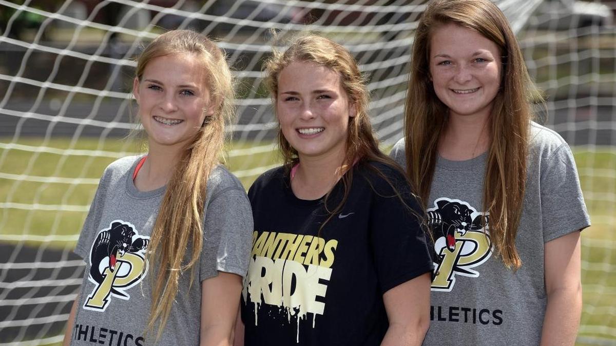 Providence High's girls soccer team members sophomore Mady Ellis, left, junior Molly McGarry, and senior Jenn Simons at the school on Tuesday, April 19, 2016. The Providence High's girls soccer team is No. 1 in the new USA Today poll and have given up one goal in a month.