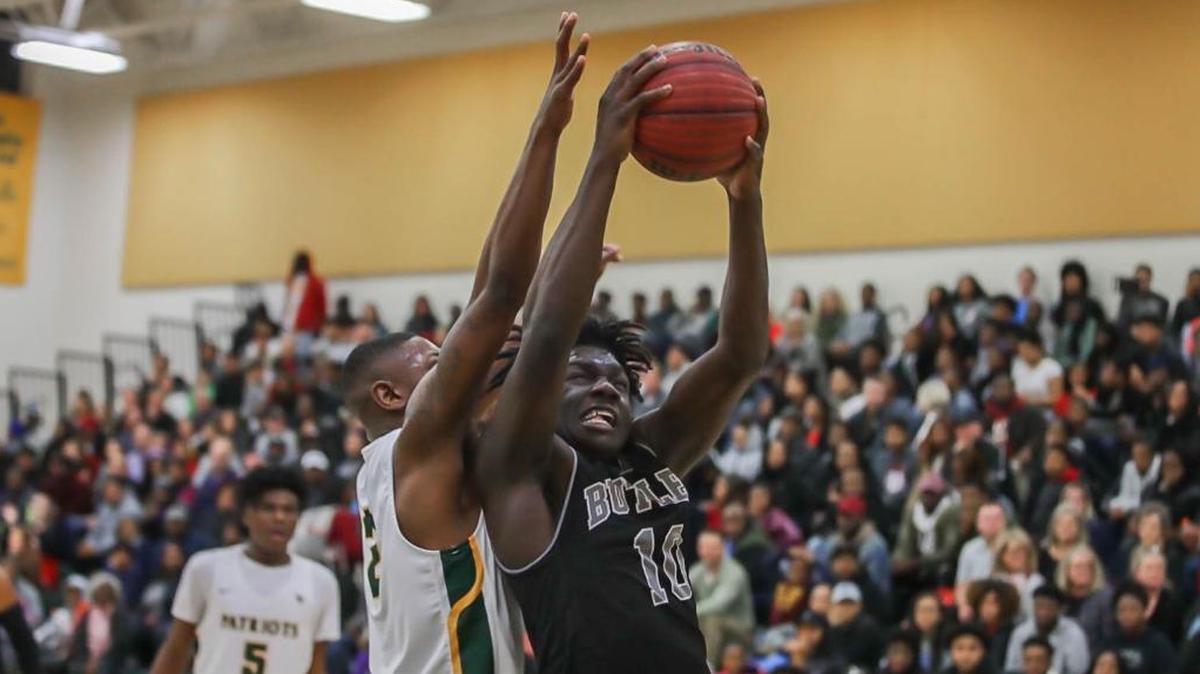 Butler's Gerrale Gates goes up for an offensive rebound during the first half of the Butler-Independence game on Friday, Dec. 14, 2017.