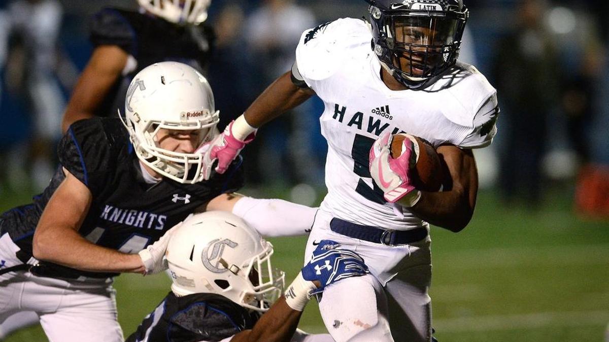 Latin running back DeMarkes Stradford (right) has rushed for more than 100 yards in each of the Hawks’ seven games this season.